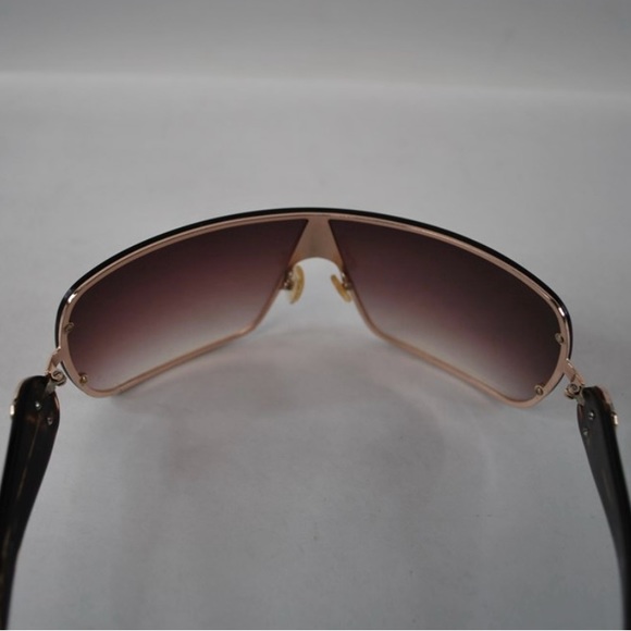 VersaceMOD 2126 1002/13
Gold with Tortoiseshell Arms
Brown gradient - Picture 7 of 9
